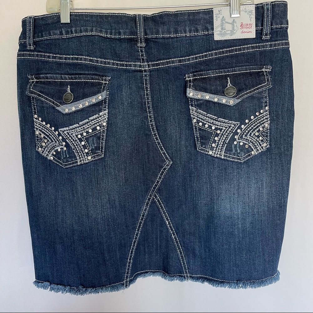 Baker Street jean skirt with embellished with white rhinestones on back pockets